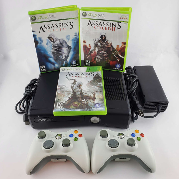 Paquete de consola Xbox 360: Assassin's Creed I, II y III