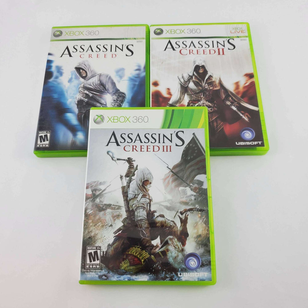 Paquete de consola Xbox 360: Assassin's Creed I, II y III
